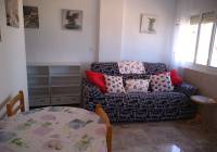 REF 10238 sitting room frontline beach apartment in Los Arenales del Sol